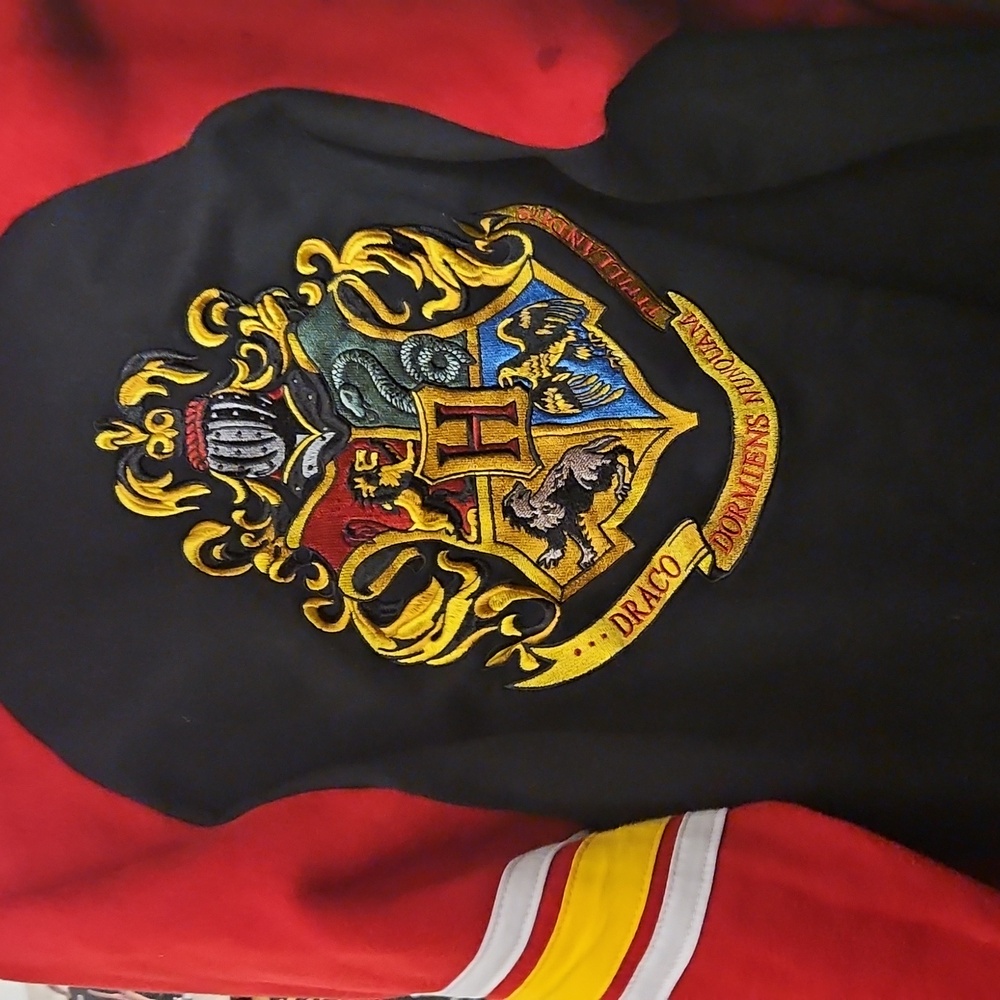 Wizarding World of Harry Potter Hogwarts Crest Zip-Up Hoodie. Two Side Pockets